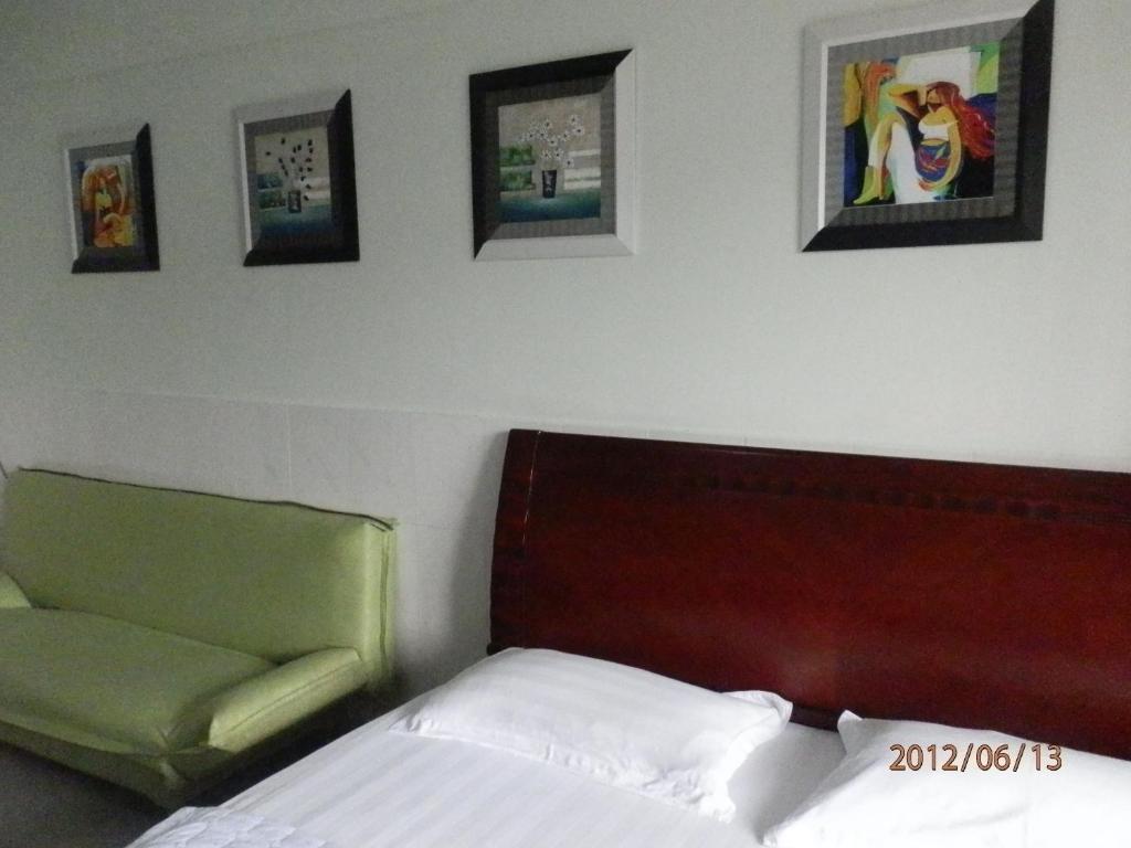 Xingfu Hotel Nanning Chambre photo