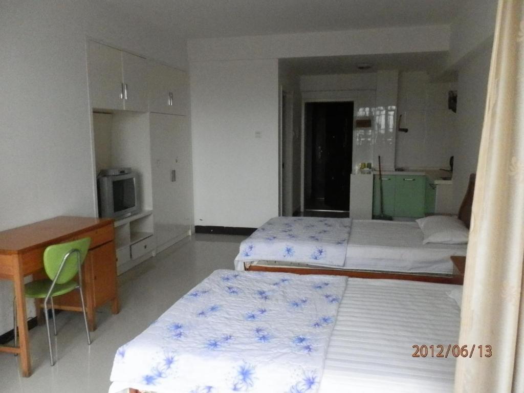 Xingfu Hotel Nanning Chambre photo